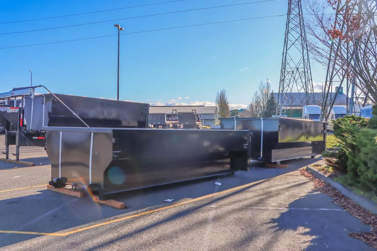 Roll-off dumpster ready for waste disposal at job site for Residential Dumpster Rental in Hopkinton